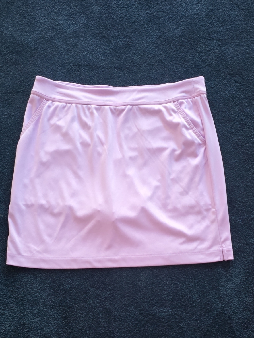 Greg Norman golf skort, lavender in color. Size medium.